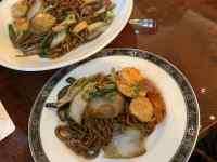 皿の上の料理
AI 生成コンテンツは誤りを含む可能性があります。